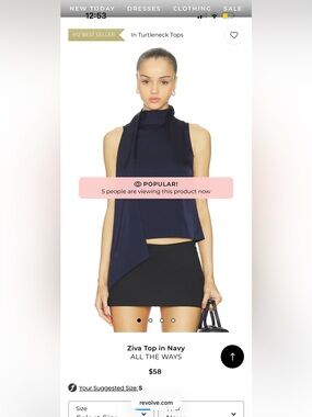 Ziva Navy Asymmetric Turtleneck Top from revolve
